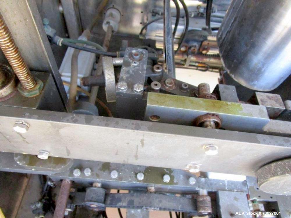 Used Pacmac Model 9500 Vertical Form, Fill, and Seal Machine with Zipper. Has a bag size range of: 3" to 15" (wide) and 4" to 19" (length). Has a maximum web width of 36". Equipped with film registra...