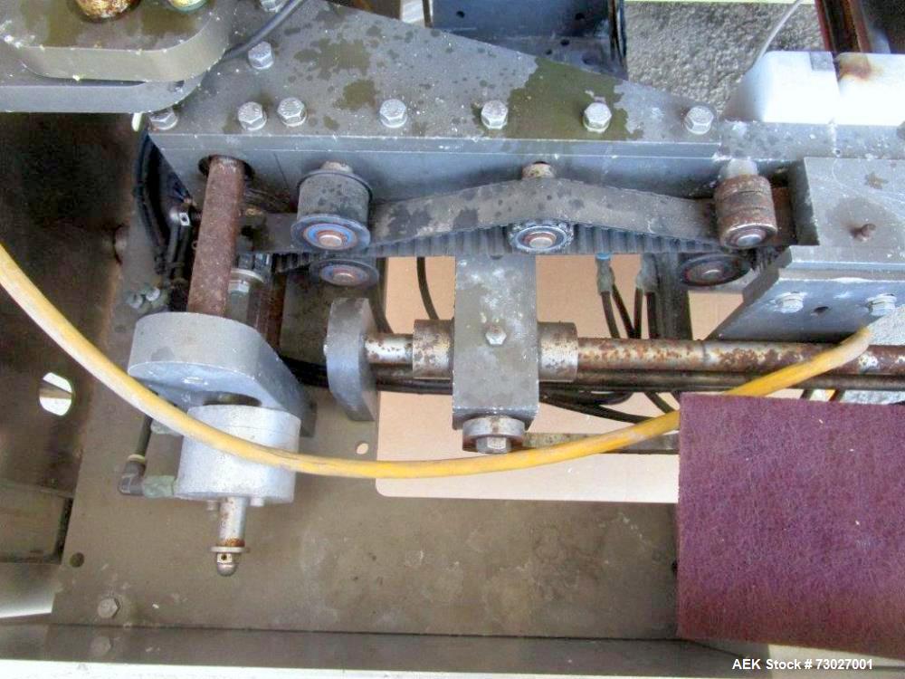 Used Pacmac Model 9500 Vertical Form, Fill, and Seal Machine with Zipper. Has a bag size range of: 3" to 15" (wide) and 4" to 19" (length). Has a maximum web width of 36". Equipped with film registra...