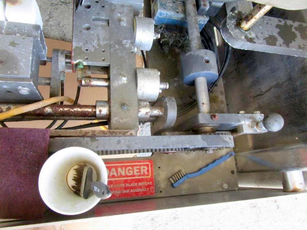 Used Pacmac Model 9500 Vertical Form, Fill, and Seal Machine with Zipper. Has a bag size range of: 3" to 15" (wide) and 4" to 19" (length). Has a maximum web width of 36". Equipped with film registra...