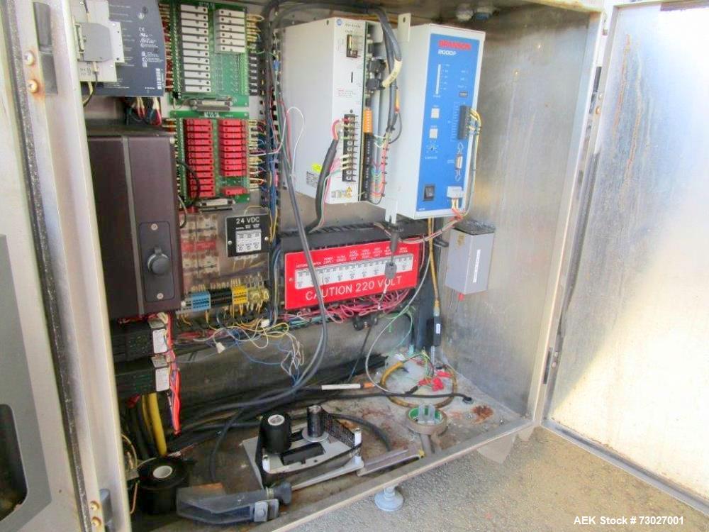 Used Pacmac Model 9500 Vertical Form, Fill, and Seal Machine with Zipper. Has a bag size range of: 3" to 15" (wide) and 4" to 19" (length). Has a maximum web width of 36". Equipped with film registra...