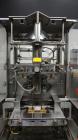 Used Sandiacre Model TG400-LX Single Tube Vertical Form, Fill & Seal Machine.