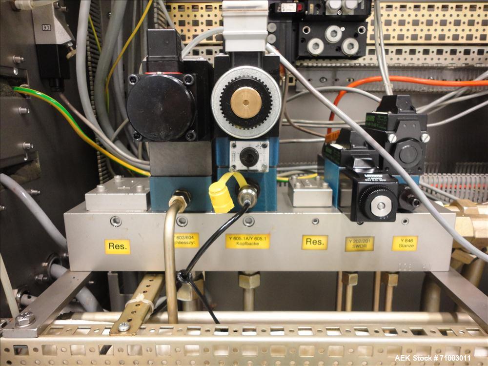 Used Rommelag Model 360M BFS Blow Fill Seal Machine.