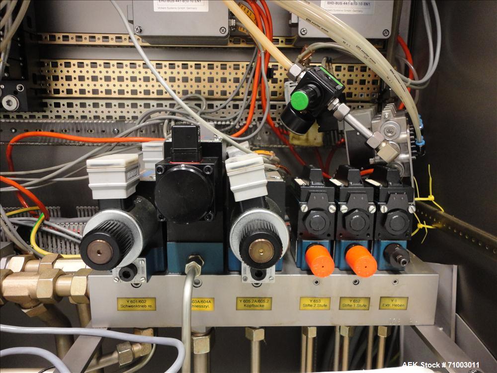 Used Rommelag Model 360M BFS Blow Fill Seal Machine.