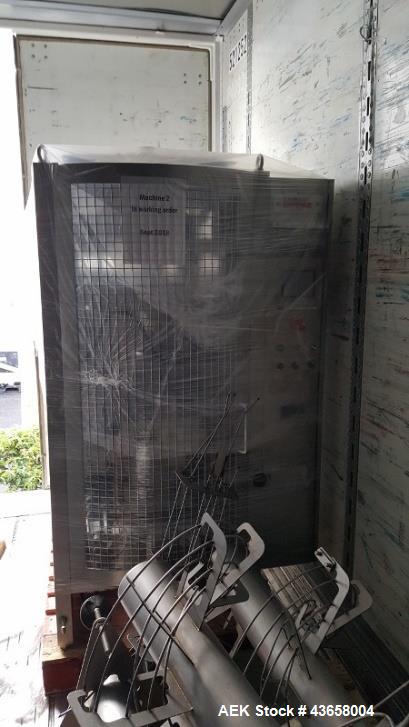 Used Cryovac Vertical Form Fill and Seal System, Model 2045C.