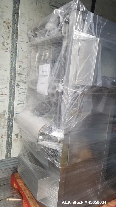 Used Cryovac Vertical Form Fill and Seal System, Model 2045C.