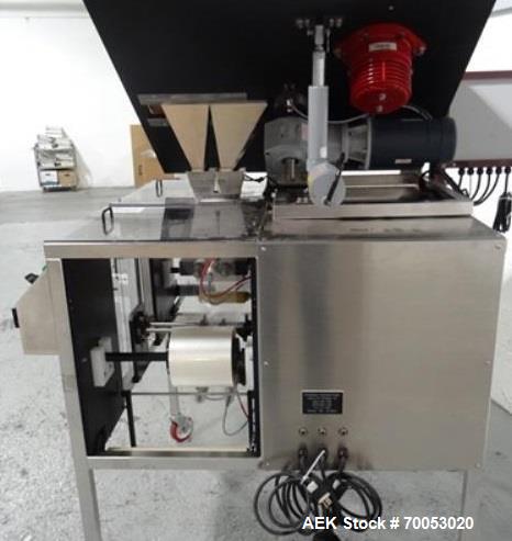 Used Phoenix Engineering Form / Fill and Seal Unit, Model GOPACKER1000. Set up with dual drop disc counter/filler for solid disage capsule or tablet products.  Vertical orientation, 1" wide x 2" long...