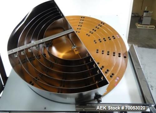 Used Phoenix Engineering Form / Fill and Seal Unit, Model GOPACKER1000. Set up with dual drop disc counter/filler for solid disage capsule or tablet products.  Vertical orientation, 1" wide x 2" long...