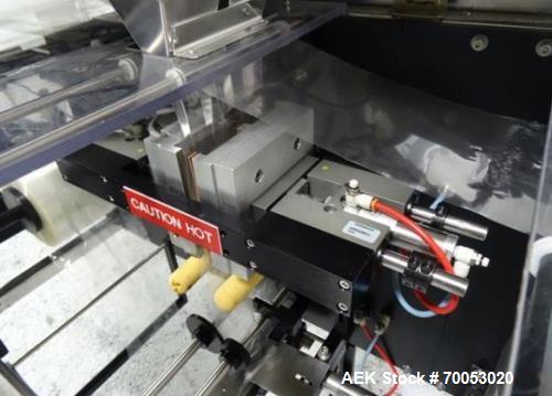 Used Phoenix Engineering Form / Fill and Seal Unit, Model GOPACKER1000. Set up with dual drop disc counter/filler for solid disage capsule or tablet products.  Vertical orientation, 1" wide x 2" long...
