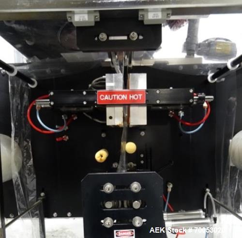 Used Phoenix Engineering Form / Fill and Seal Unit, Model GOPACKER1000. Set up with dual drop disc counter/filler for solid disage capsule or tablet products.  Vertical orientation, 1" wide x 2" long...