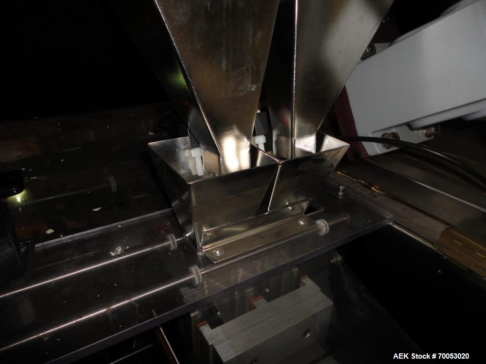 Used Phoenix Engineering Form / Fill and Seal Unit, Model GOPACKER1000. Set up with dual drop disc counter/filler for solid disage capsule or tablet products.  Vertical orientation, 1" wide x 2" long...