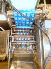 Used Paxall Circle V16 Vertical Pouch Machine with Tablet Feeder.