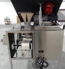 Used Phoenix Engineering Form / Fill and Seal Unit, Model GOPACKER1000. Set up with dual drop disc counter/filler for solid disage capsule or tablet products.  Vertical orientation, 1