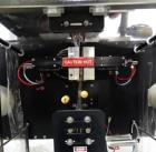 Used Phoenix Engineering Form / Fill and Seal Unit, Model GOPACKER1000. Set up with dual drop disc counter/filler for solid disage capsule or tablet products.  Vertical orientation, 1
