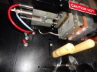 Used Phoenix Engineering Form / Fill and Seal Unit, Model GOPACKER1000. Set up with dual drop disc counter/filler for solid disage capsule or tablet products.  Vertical orientation, 1