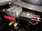 Used Phoenix Engineering Form / Fill and Seal Unit, Model GOPACKER1000. Set up with dual drop disc counter/filler for solid disage capsule or tablet products.  Vertical orientation, 1