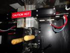 Used Phoenix Engineering Form / Fill and Seal Unit, Model GOPACKER1000. Set up with dual drop disc counter/filler for solid disage capsule or tablet products.  Vertical orientation, 1