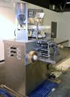 Used Wrap Ade Model TT4 Vertical Strip Packaging Machine