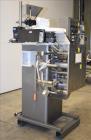 Used- Wrapade Model UPH 4 Vertical Strip/Pouch Machine for Vitamins/Candy