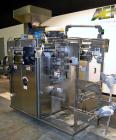 Used WrapAde Model VSP 6R2 Vertical Strip Packaging Machine