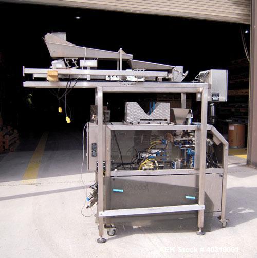 Used Jaguar M7000 single lane preform bag pouch filler and sealer capable of speeds up to 20 bags per minute. Bag range handling 4" to 12" wide x 19" long, 1.5 to 5 mil. Weight up to 20lbs. 400 bag m...
