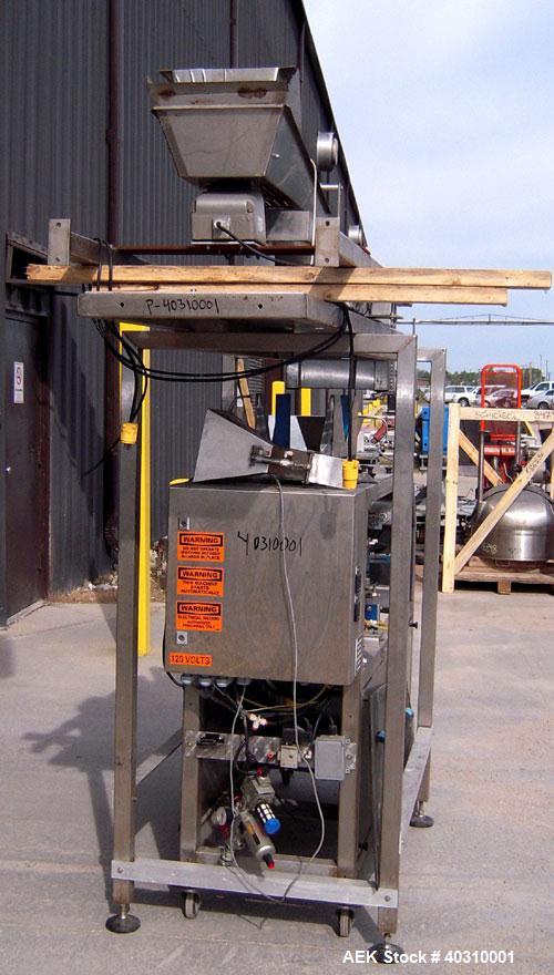 Used Jaguar M7000 single lane preform bag pouch filler and sealer capable of speeds up to 20 bags per minute. Bag range handling 4" to 12" wide x 19" long, 1.5 to 5 mil. Weight up to 20lbs. 400 bag m...