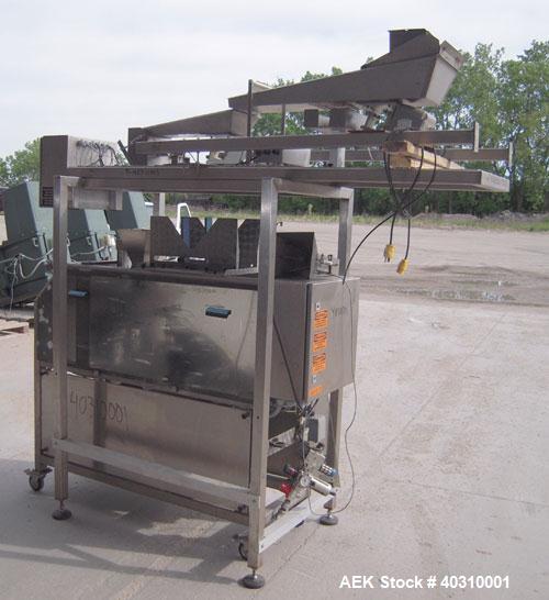 Used Jaguar M7000 single lane preform bag pouch filler and sealer capable of speeds up to 20 bags per minute. Bag range handling 4" to 12" wide x 19" long, 1.5 to 5 mil. Weight up to 20lbs. 400 bag m...