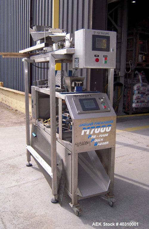 Used Jaguar M7000 single lane preform bag pouch filler and sealer capable of speeds up to 20 bags per minute. Bag range handling 4" to 12" wide x 19" long, 1.5 to 5 mil. Weight up to 20lbs. 400 bag m...