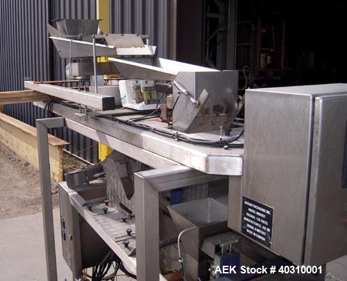 Used Jaguar M7000 single lane preform bag pouch filler and sealer capable of speeds up to 20 bags per minute. Bag range handling 4" to 12" wide x 19" long, 1.5 to 5 mil. Weight up to 20lbs. 400 bag m...