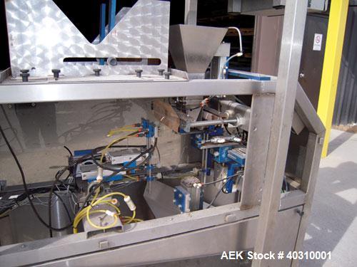 Used Jaguar M7000 single lane preform bag pouch filler and sealer capable of speeds up to 20 bags per minute. Bag range handling 4" to 12" wide x 19" long, 1.5 to 5 mil. Weight up to 20lbs. 400 bag m...