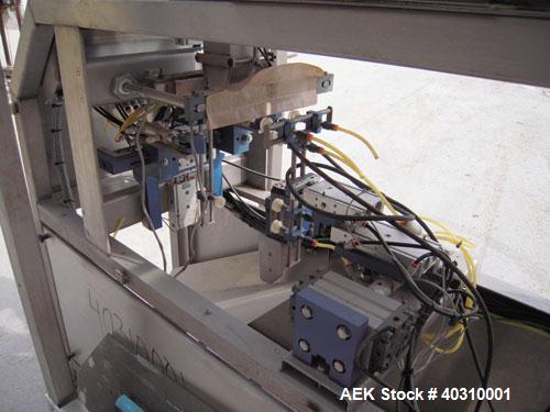 Used Jaguar M7000 single lane preform bag pouch filler and sealer capable of speeds up to 20 bags per minute. Bag range handling 4" to 12" wide x 19" long, 1.5 to 5 mil. Weight up to 20lbs. 400 bag m...