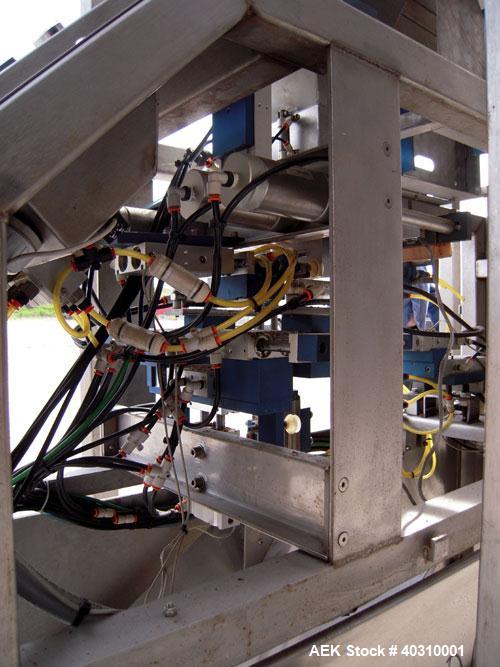 Used Jaguar M7000 single lane preform bag pouch filler and sealer capable of speeds up to 20 bags per minute. Bag range handling 4" to 12" wide x 19" long, 1.5 to 5 mil. Weight up to 20lbs. 400 bag m...