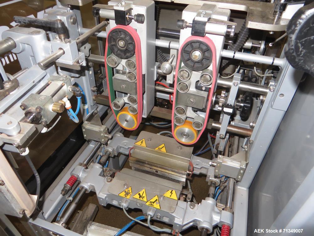 Used Hayssen Model 300E Vertical form fill and seal packaging system. Complete line includes with Ishida 16 head dimpled/embossed bucket scale  , Allen-Bradley Compact Logix L31 controls,  mild steel...