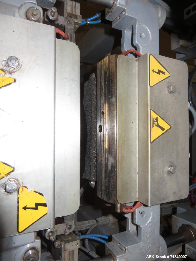 Used Hayssen Model 300E Vertical form fill and seal packaging system. Complete line includes with Ishida 16 head dimpled/embossed bucket scale  , Allen-Bradley Compact Logix L31 controls,  mild steel...