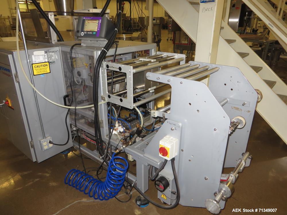 Used Hayssen Model 300E Vertical form fill and seal packaging system. Complete line includes with Ishida 16 head dimpled/embossed bucket scale  , Allen-Bradley Compact Logix L31 controls,  mild steel...