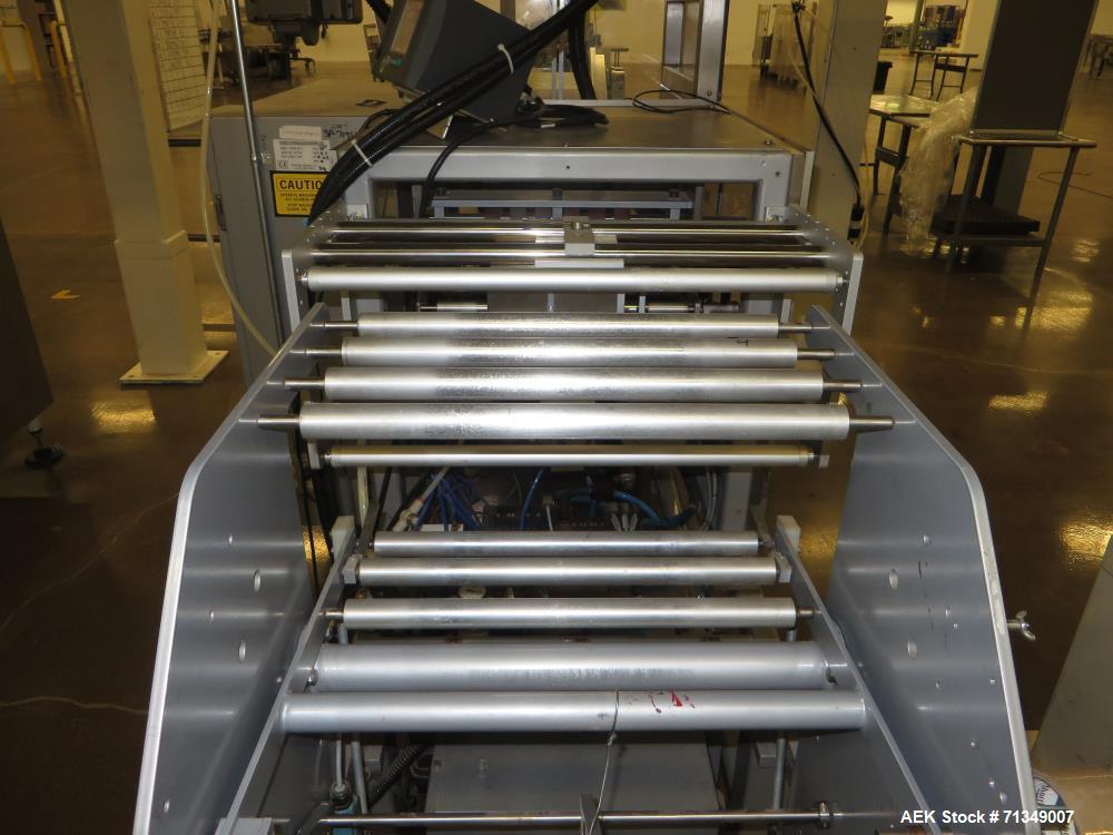 Used Hayssen Model 300E Vertical form fill and seal packaging system. Complete line includes with Ishida 16 head dimpled/embossed bucket scale  , Allen-Bradley Compact Logix L31 controls,  mild steel...