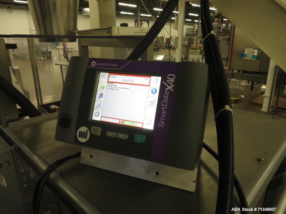 Used Hayssen Model 300E Vertical form fill and seal packaging system. Complete line includes with Ishida 16 head dimpled/embossed bucket scale  , Allen-Bradley Compact Logix L31 controls,  mild steel...