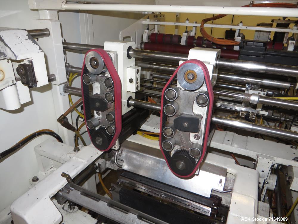 Used Hayssen Ultima Ultra 13-19HR Vertical form fill and seal packaging system. Complete line includes with Ishida 14 head  dimpled/embossed bucket scale and mild steel platform, Allen Bradley SLC 5/...