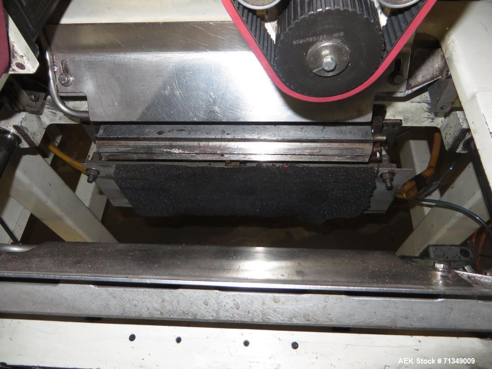 Used Hayssen Ultima Ultra 13-19HR Vertical form fill and seal packaging system. Complete line includes with Ishida 14 head  dimpled/embossed bucket scale and mild steel platform, Allen Bradley SLC 5/...