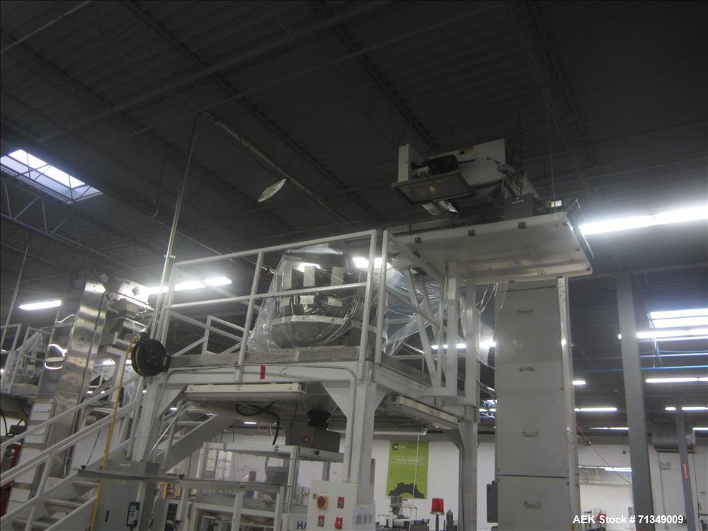 Used Hayssen Ultima Ultra 13-19HR Vertical form fill and seal packaging system. Complete line includes with Ishida 14 head  dimpled/embossed bucket scale and mild steel platform, Allen Bradley SLC 5/...