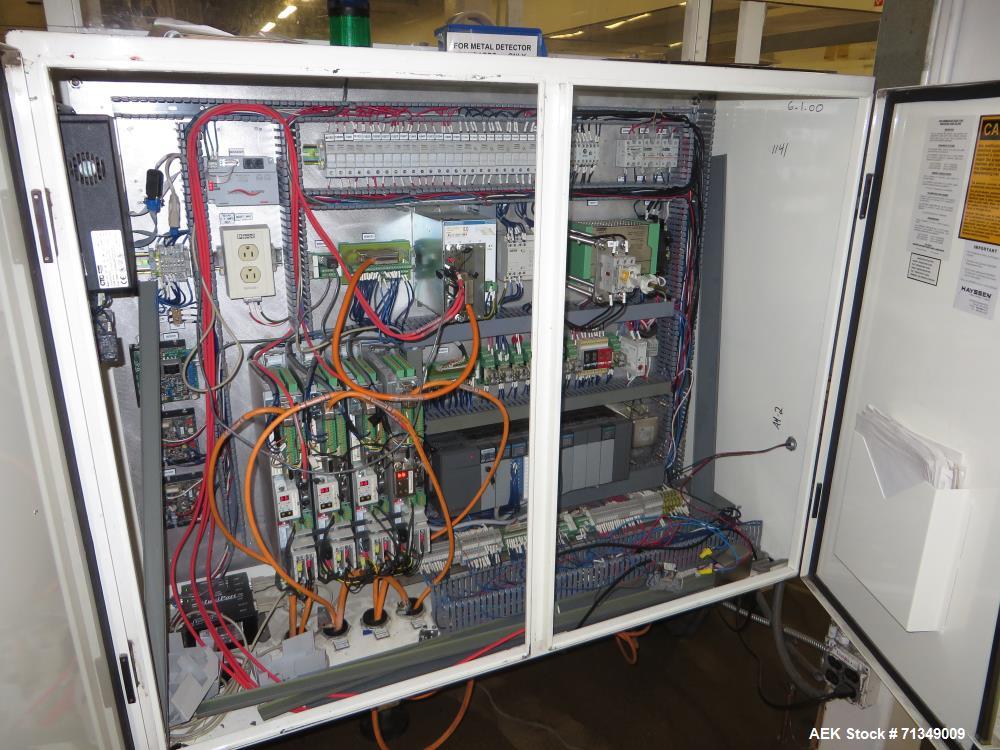 Used Hayssen Ultima Ultra 13-19HR Vertical form fill and seal packaging system. Complete line includes with Ishida 14 head  dimpled/embossed bucket scale and mild steel platform, Allen Bradley SLC 5/...