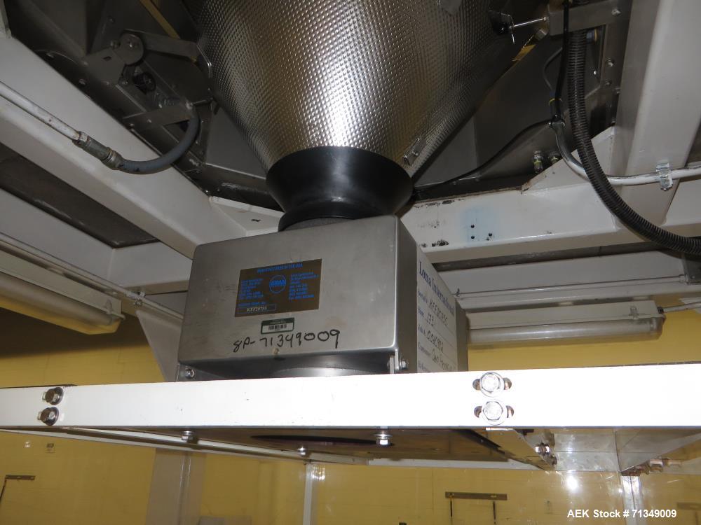 Used Hayssen Ultima Ultra 13-19HR Vertical form fill and seal packaging system. Complete line includes with Ishida 14 head  dimpled/embossed bucket scale and mild steel platform, Allen Bradley SLC 5/...