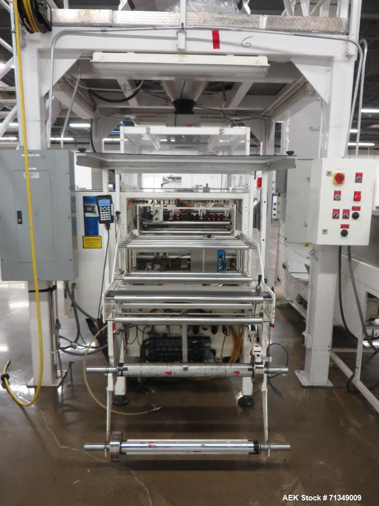 Used Hayssen Ultima Ultra 13-19HR Vertical form fill and seal packaging system. Complete line includes with Ishida 14 head  dimpled/embossed bucket scale and mild steel platform, Allen Bradley SLC 5/...