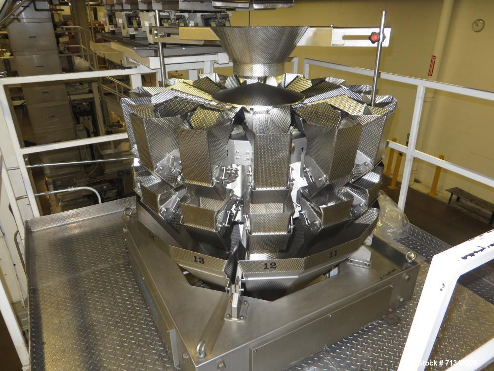 Used Hayssen Ultima Ultra 13-19HR Vertical form fill and seal packaging system. Complete line includes with Ishida 14 head  dimpled/embossed bucket scale and mild steel platform, Allen Bradley SLC 5/...