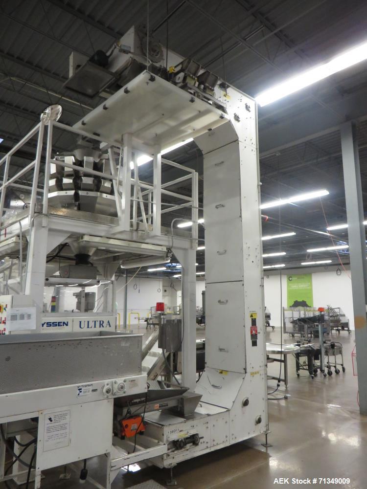Used Hayssen Ultima Ultra 13-19HR Vertical form fill and seal packaging system. Complete line includes with Ishida 14 head  dimpled/embossed bucket scale and mild steel platform, Allen Bradley SLC 5/...