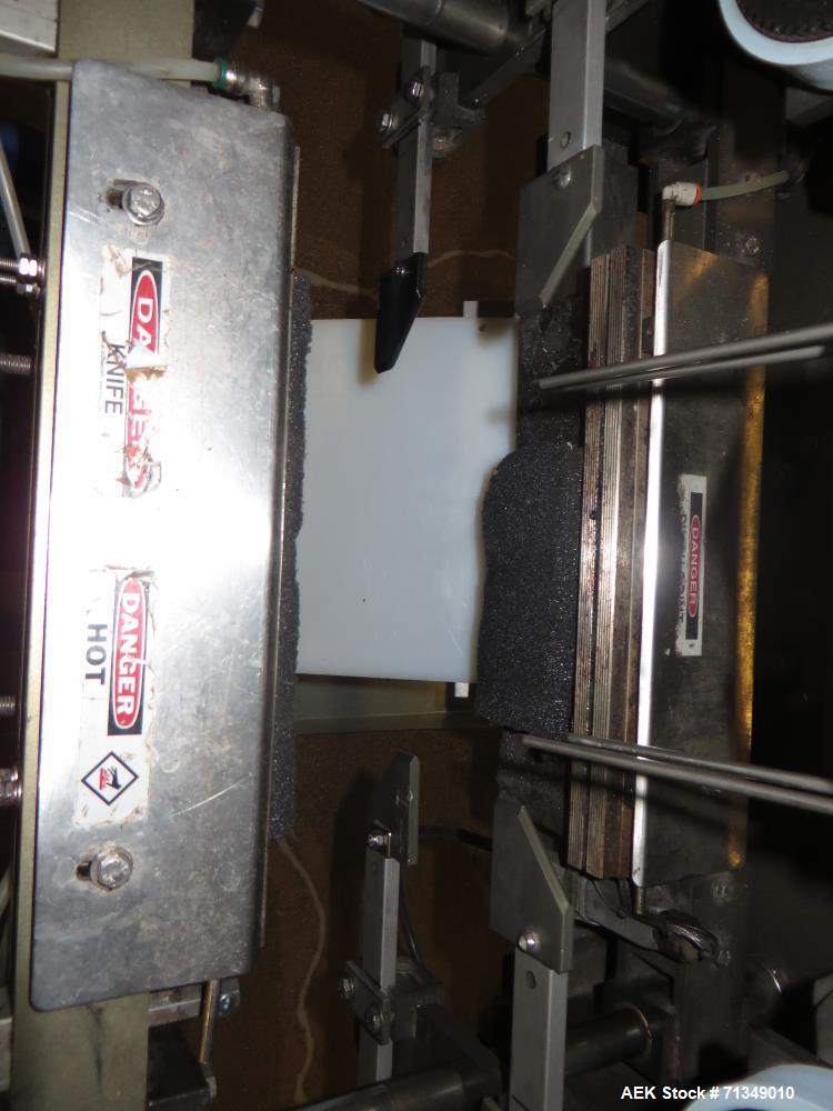 Used Matrix Packaging  Model  201318R  Vertical form fill and seal packaging system. Complete line includes Yamato Adw-714sv scale  dimpled/embossed bucket scale and  Allen-Bradley Micrologix 1500 an...