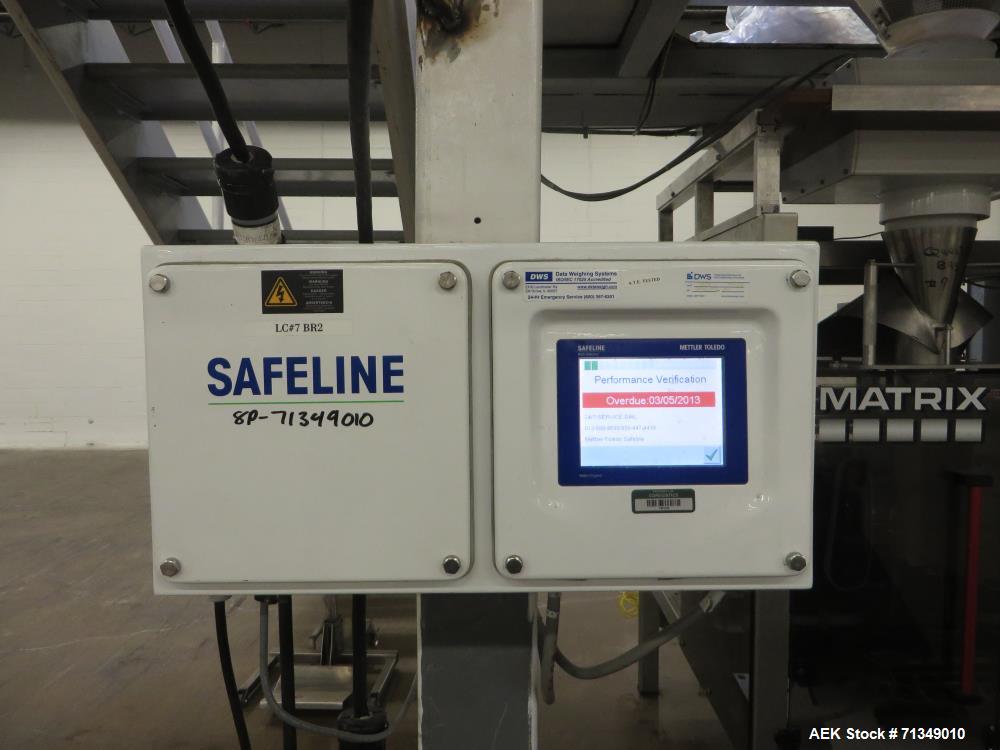 Used Matrix Packaging  Model  201318R  Vertical form fill and seal packaging system. Complete line includes Yamato Adw-714sv scale  dimpled/embossed bucket scale and  Allen-Bradley Micrologix 1500 an...