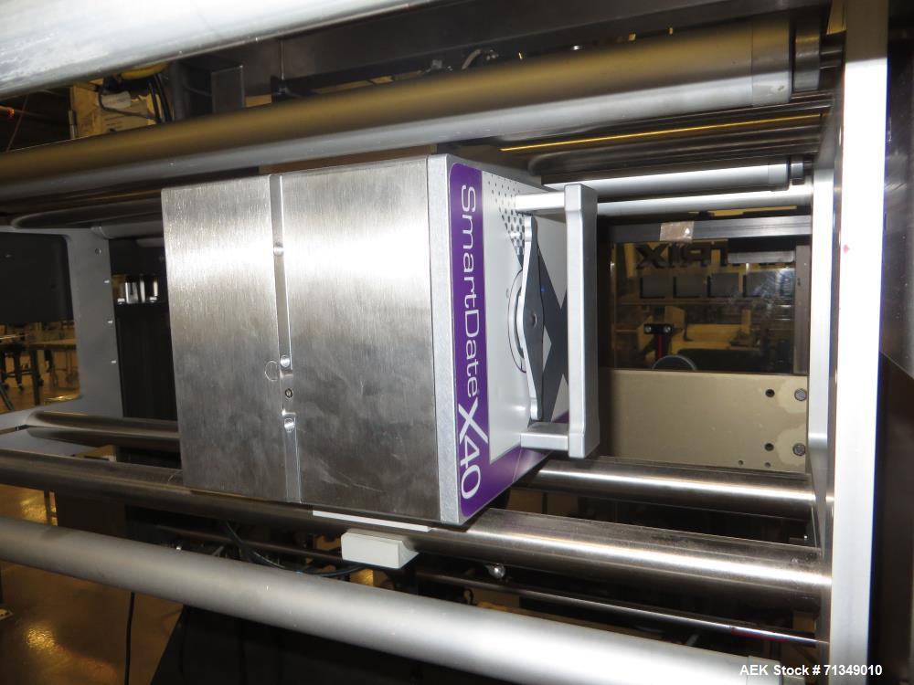 Used Matrix Packaging  Model  201318R  Vertical form fill and seal packaging system. Complete line includes Yamato Adw-714sv scale  dimpled/embossed bucket scale and  Allen-Bradley Micrologix 1500 an...