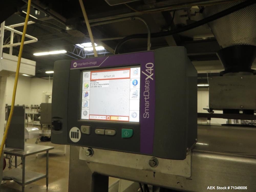 Used Matrix Mercury Model  2840R Vertical form fill and seal packaging system. Complete line includes with Yamato Zigma Series 10 head  dimpled/embossed bucket scale , Has mild steel platform, hot st...