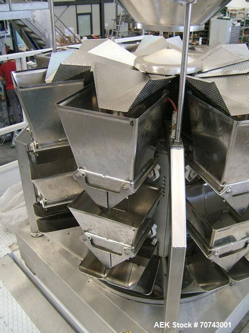 Used Simionato Packaging Line comprisin of one multihead weigher,  one platform, one VFFS machine.  Including one forming tube for pillow bags with 4.72" (120 mm) width or block bottom 2.95" x 1.58" ...