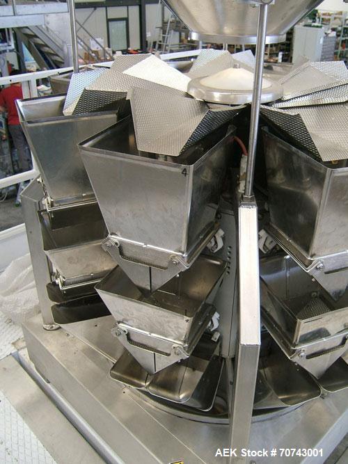 Used-Simionato Packaging Line comprisin of one multihead weigher,  one platform, one VFFS machine.  Including one forming tu...